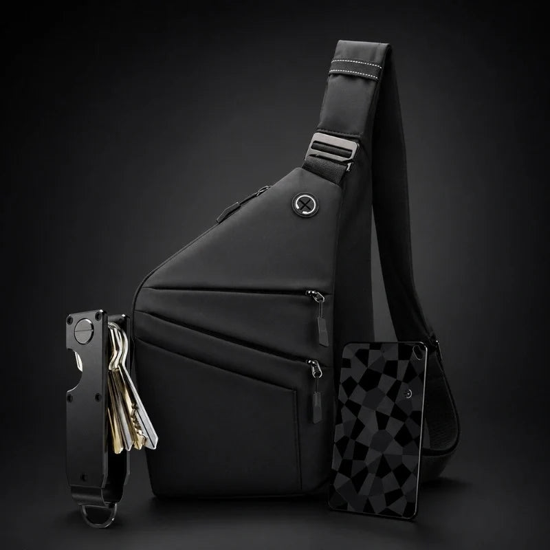 Bandolera antirrobo negra KÄRN junto a organizador de llaves y tarjetero RFID sobre fondo oscuro.