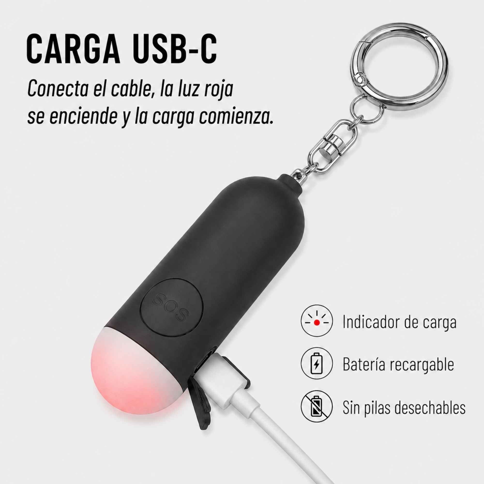 Alarma personal KÄRN cargándose por USB-C con indicador rojo y batería recargable