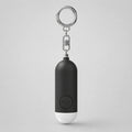 Alarma personal KÄRN negra con llavero y botón SOS, accesorio de seguridad para bolso, mochila o llaves