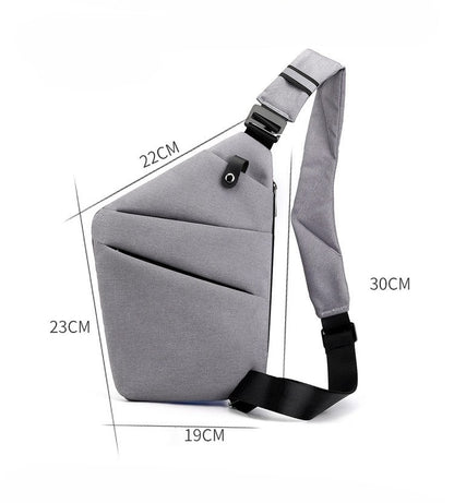 Medidas de la Mochila Antirrobo Slim gris KÄRN – dimensiones compactas 30x23x19 cm con diseño ergonómico y correa ajustable.