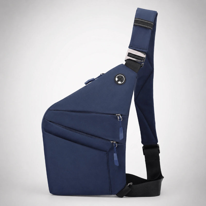 Mochila cruzada antirrobo Smart KÄRN azul marino en vista lateral, diseño compacto para uso diario