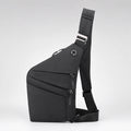 Mochila cruzada antirrobo Smart KÄRN negra en vista lateral, diseño compacto con varios compartimentos