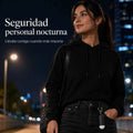 Alarma personal KÄRN en uso de noche en la ciudad