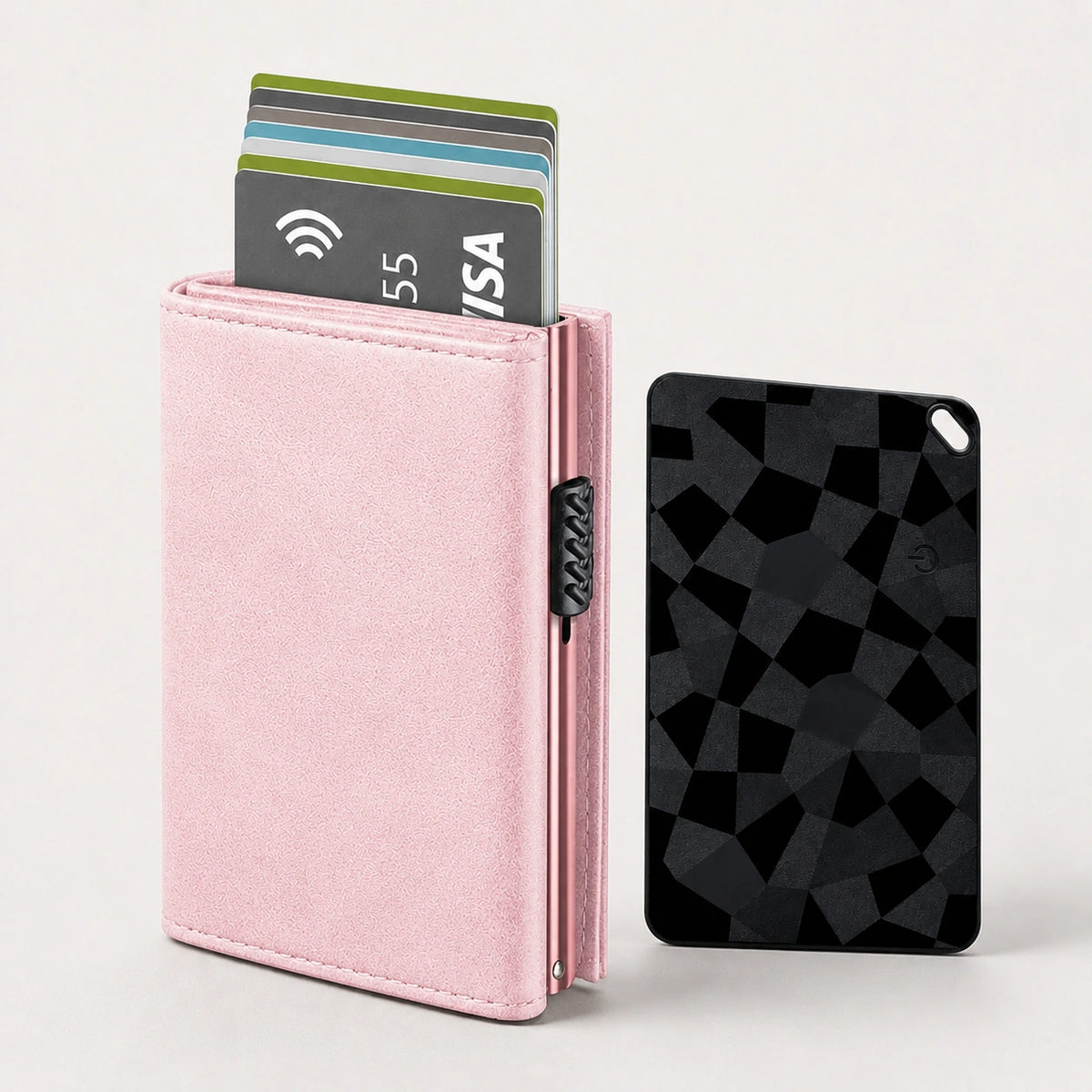 Tarjetero RFID Slim Pro KÄRN negro con tarjetas desplegadas junto a FindCard KÄRN rosa