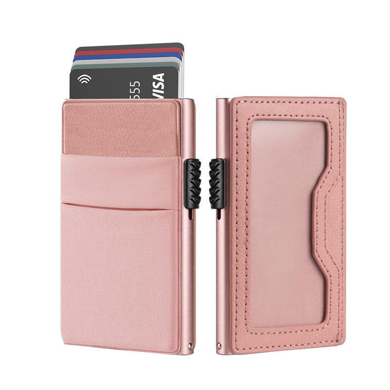Tarjetero RFID KÄRN de piel rosa metálica con compartimento para tarjetas y documento de identidad, diseño elegante y seguro para mujer.